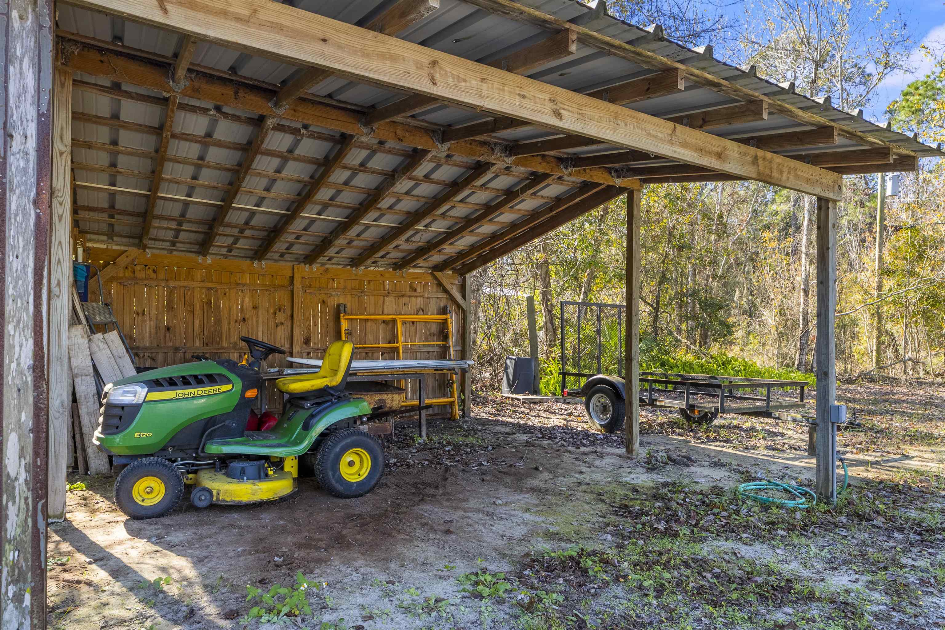2905 County Road 214, Unit D St. Augustine, FL 32084 - Photo 41 of 46 a view of outdoor space with porch and furniture
