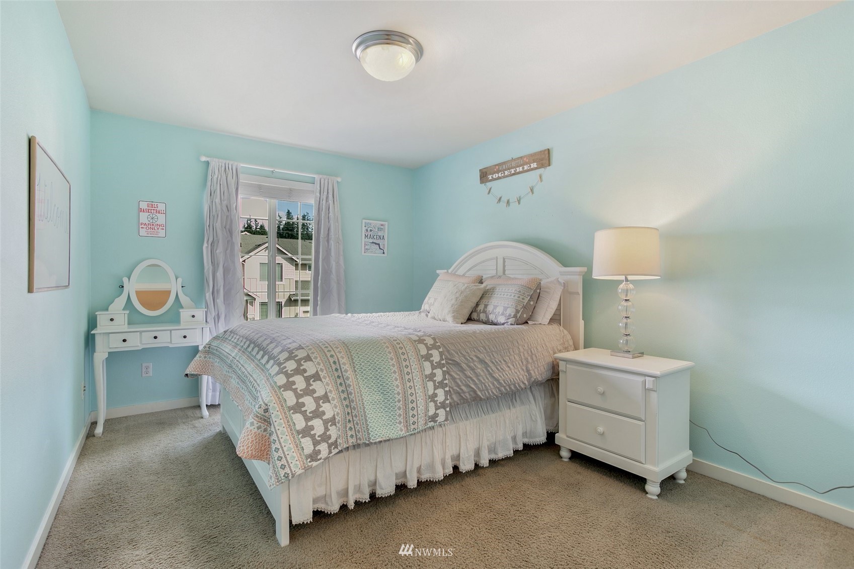 21804 42 Avenue Southeast Bothell, WA 98021 - Photo 24 of 33 a bedroom with a bed and a table