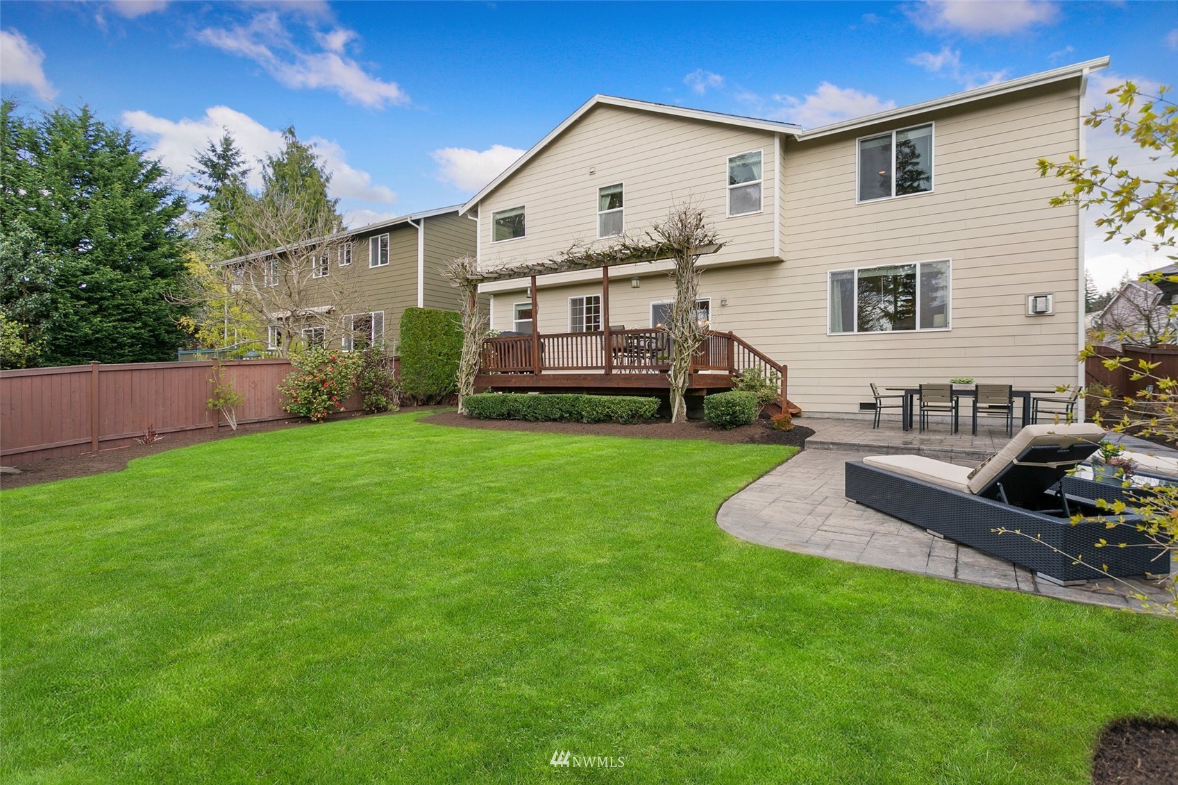 21804 42 Avenue Southeast Bothell, WA 98021 - Photo 28 of 33 a front view of a house with a yard and outdoor seating