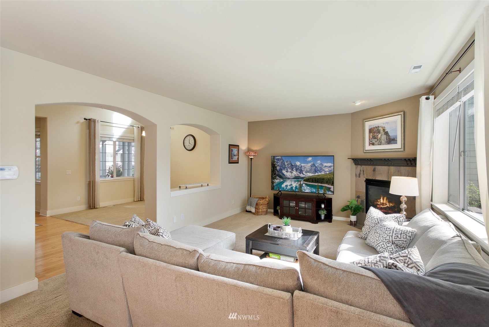 21804 42 Avenue Southeast Bothell, WA 98021 - Photo 6 of 33 a living room with furniture and a flat screen tv