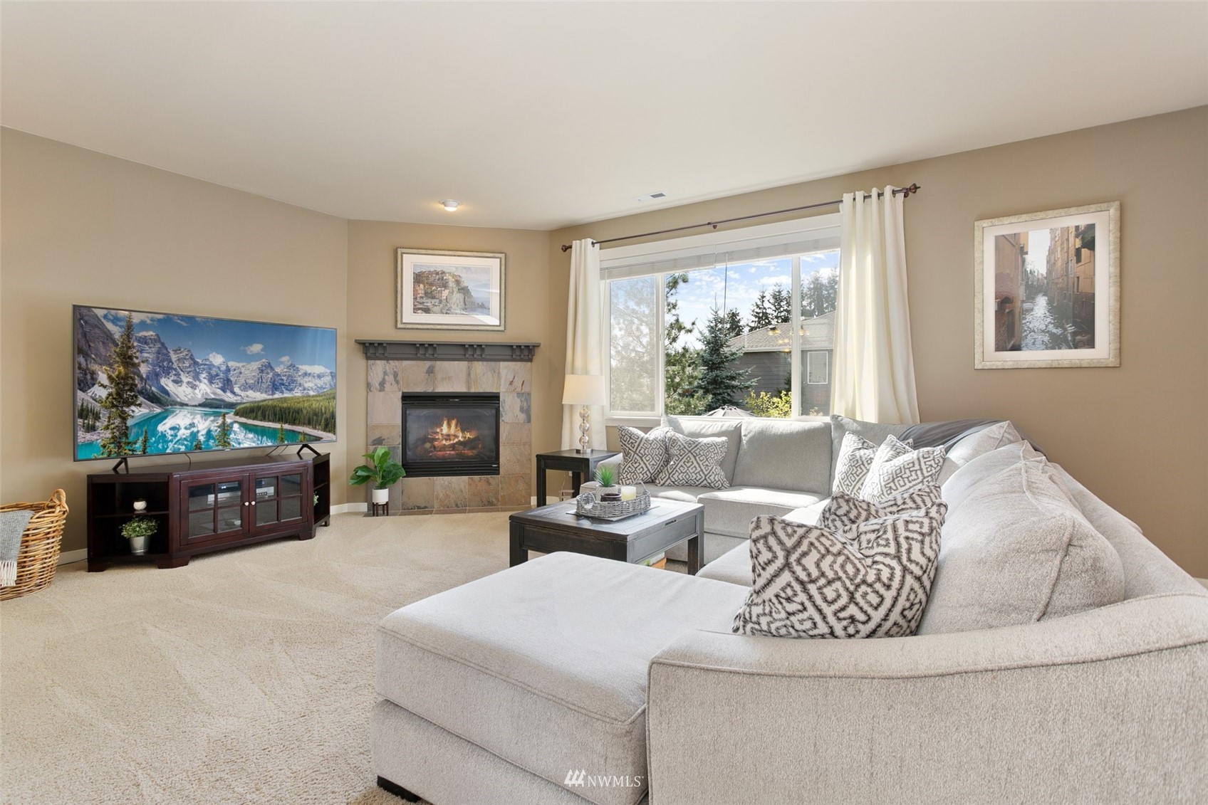 21804 42 Avenue Southeast Bothell, WA 98021 - Photo 7 of 33 a living room with furniture and a fireplace
