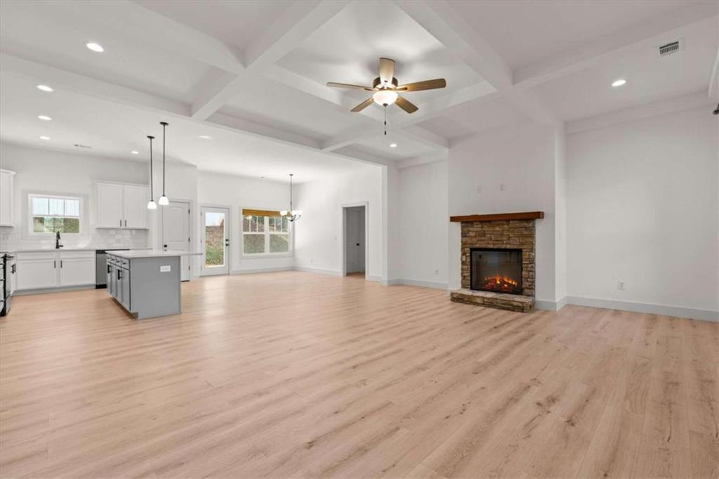 51 Post Oak Trace Villa Rica, GA 30180 - Photo 11 of 54 a view of an empty room with a fireplace and window