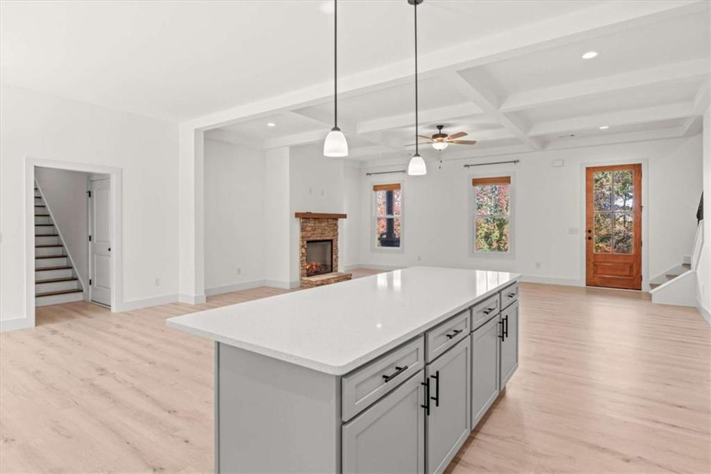 51 Post Oak Trace Villa Rica, GA 30180 - Photo 20 of 54 a kitchen with a stove a refrigerator a sink and wooden floor