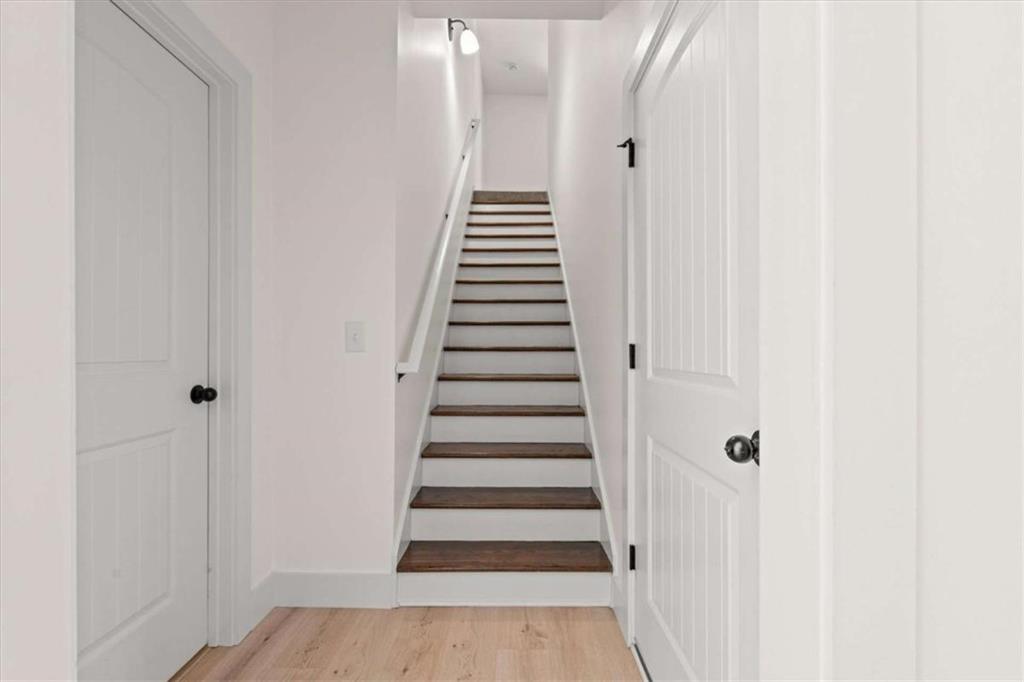 51 Post Oak Trace Villa Rica, GA 30180 - Photo 35 of 54 a view of a hallway with stairs and wooden floor