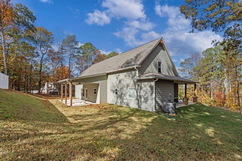 51 Post Oak Trace Villa Rica, GA 30180 - Photo 45 of 54 a view of a house with a yard