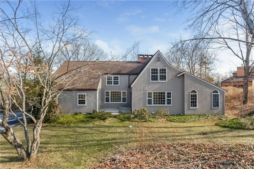 44 Arapaho Road Brookfield, CT 06804 - Photo 1 of 1 a front view of a house with a garden