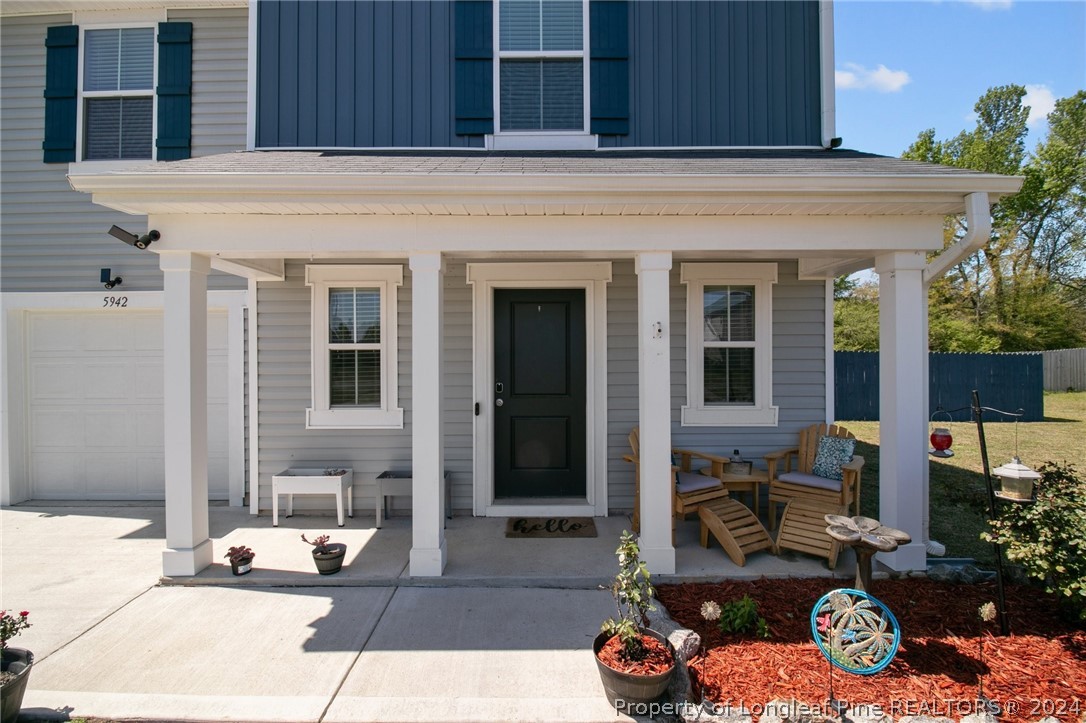 5942 Lowgrass Road Stedman, NC 28391 - Photo 27 of 28 a view of a building with sitting area