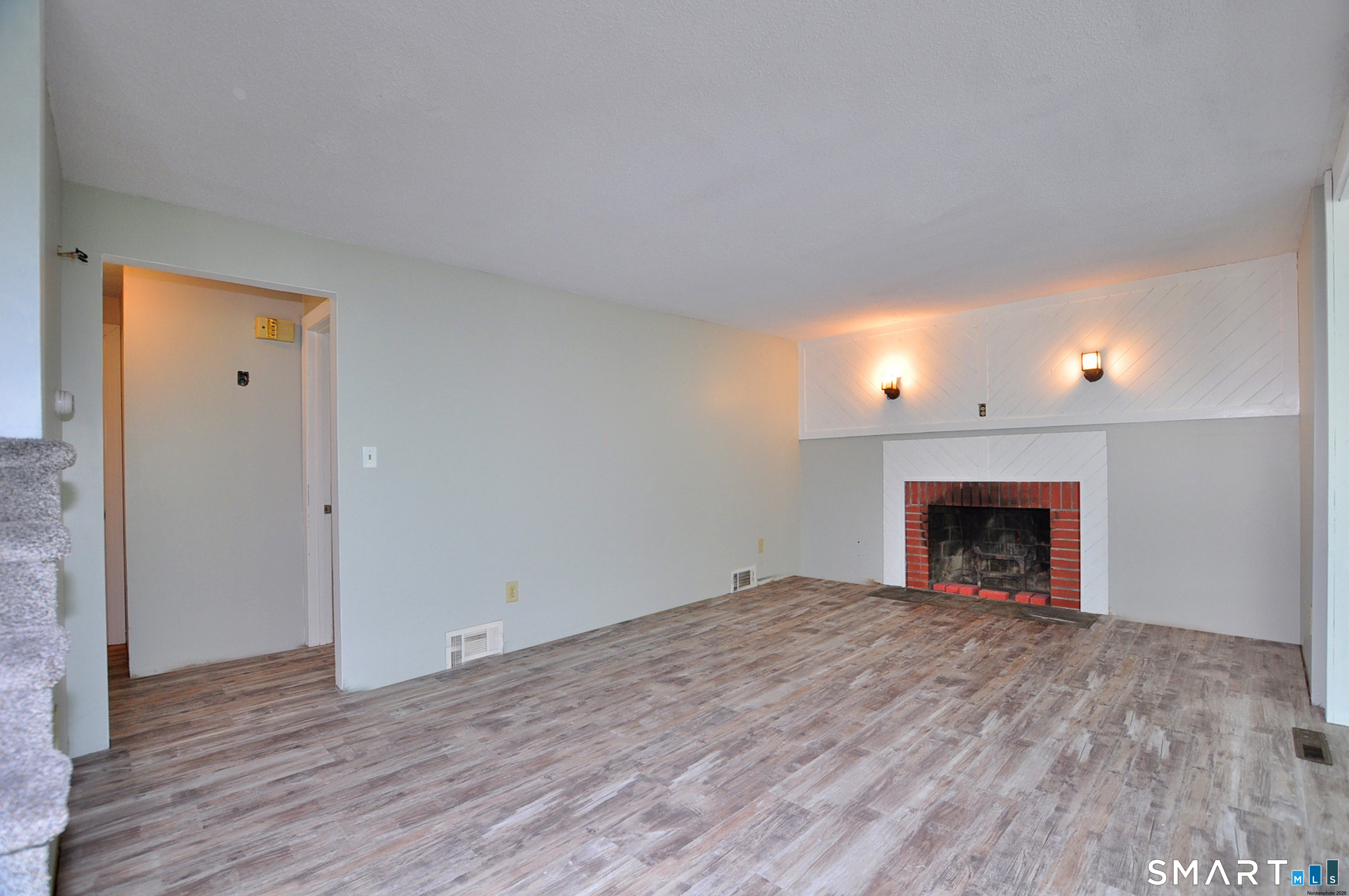 526 Granville Road Hartland, CT 06027 - Photo 14 of 37 Living room with new flooring