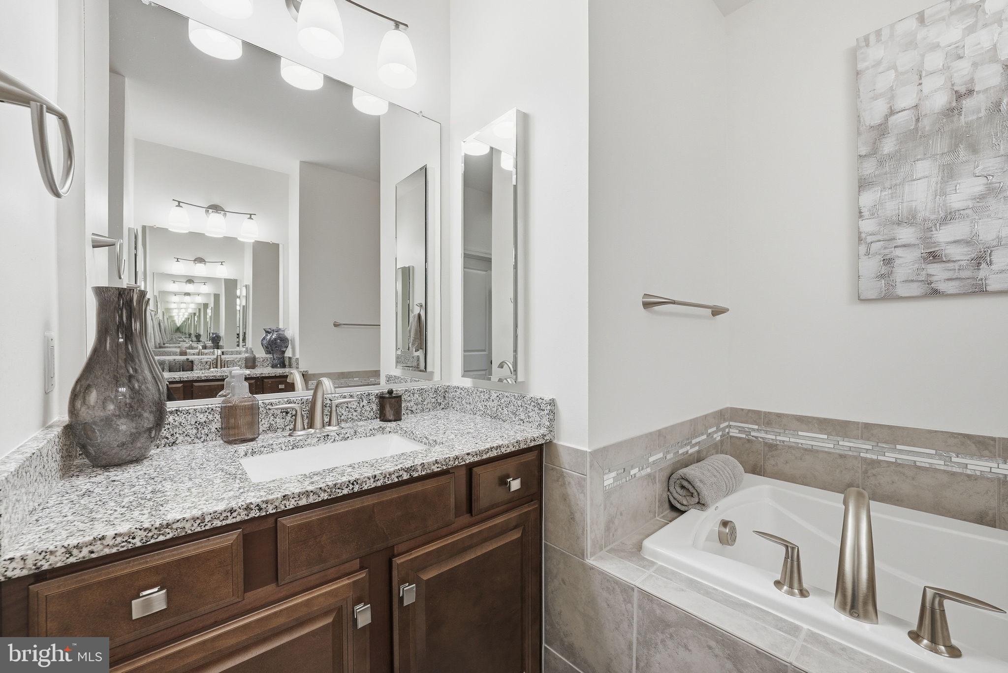9146 Power House Road Lorton, VA 22079 - Photo 27 of 60 Ensuite primary bath, 2 separate vanities