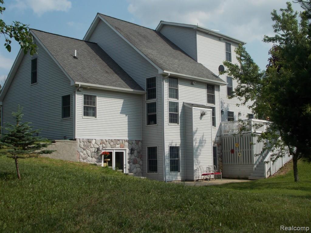 2974 Hannan Road Imlay City, MI 48444 - Photo 4 of 45 From this view, you are seeing 4 floors of living area. The walkout basement, the main living level, the upper bedroom level, plus the 3rd floor bonus room on top.