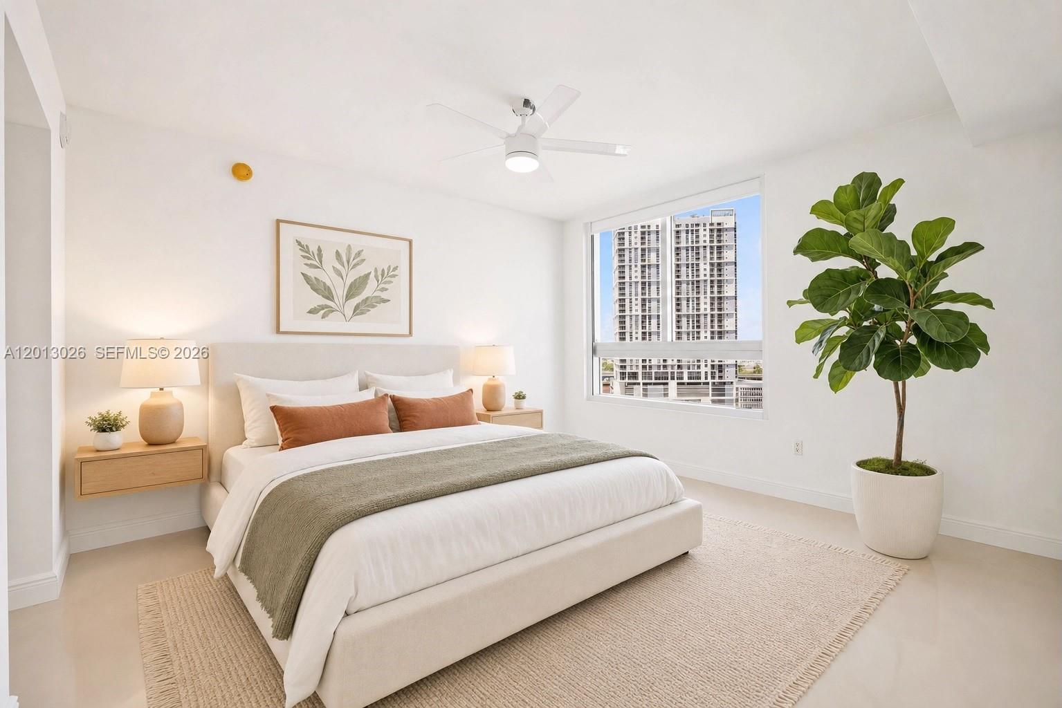 90 Southwest 3rd Street, Unit 1608 Miami, FL 33130 - Photo 3 of 44 a bedroom with a bed and a potted plant