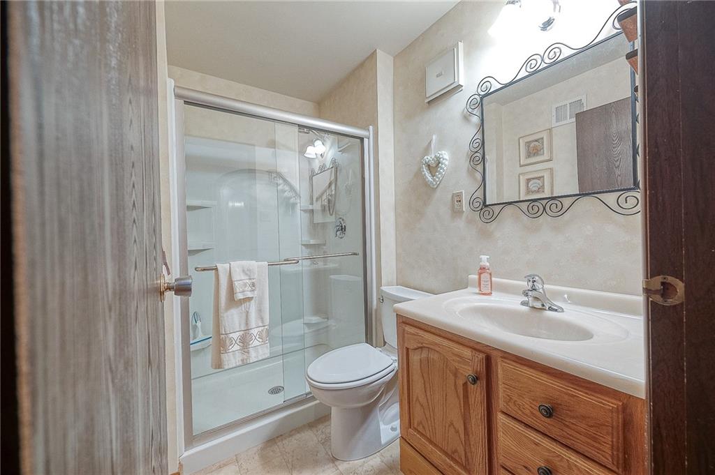 551 Sloop Road, Unit 53 Pittsburgh, PA 15237 - Photo 12 of 21 a bathroom with a sink a toilet and shower