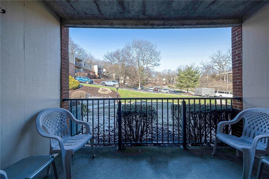 551 Sloop Road, Unit 53 Pittsburgh, PA 15237 - Photo 15 of 21 a view of a balcony with furniture