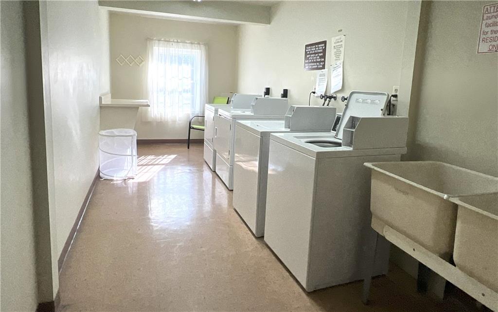 551 Sloop Road, Unit 53 Pittsburgh, PA 15237 - Photo 18 of 21 a view of a kitchen with a sink washer and dryer