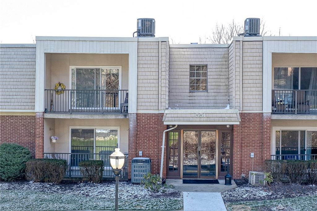 551 Sloop Road, Unit 53 Pittsburgh, PA 15237 - Photo 21 of 21 a view of a brick building and a yard