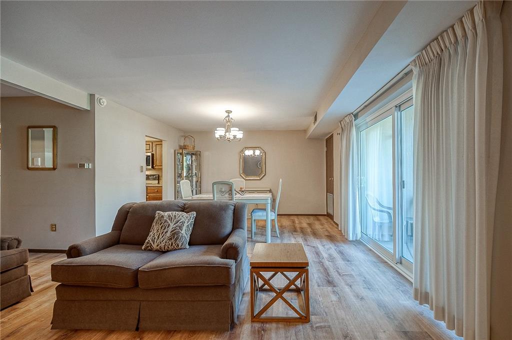 551 Sloop Road, Unit 53 Pittsburgh, PA 15237 - Photo 5 of 21 a living room with furniture and a wooden floor