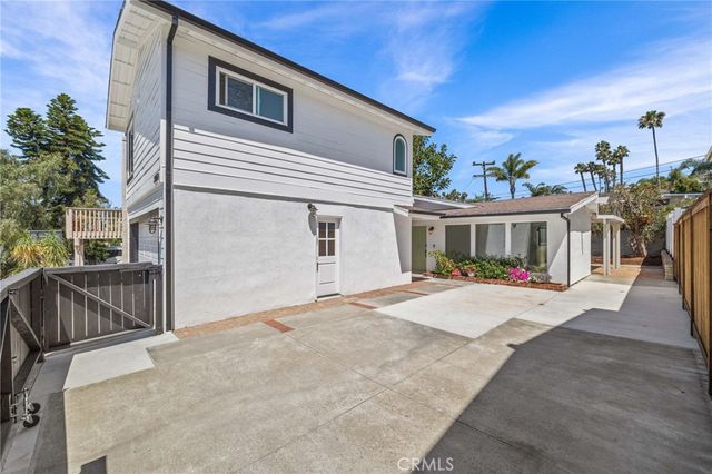 a bathroom with a sink double vanity and a mirror