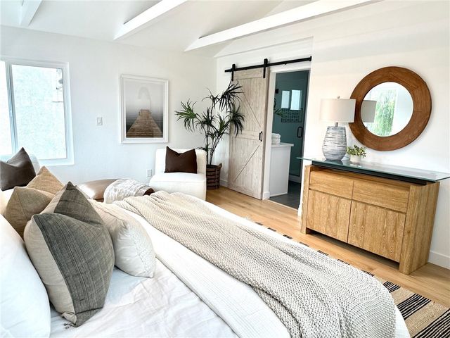 a kitchen with stainless steel appliances a sink and a stove
