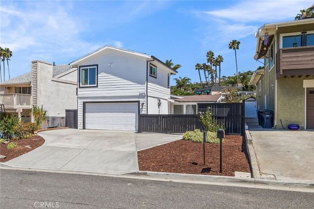 a bathroom with a shower and a bath tub