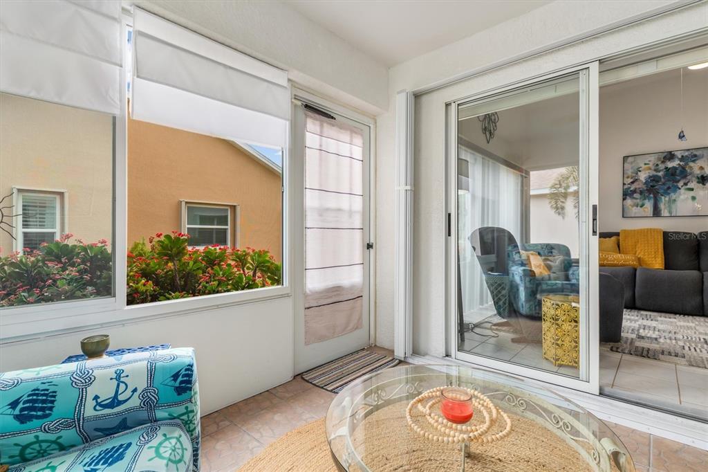 24167 Buckingham Way Punta Gorda, FL 33980 - Photo 24 of 42 a living room with furniture and a potted plant