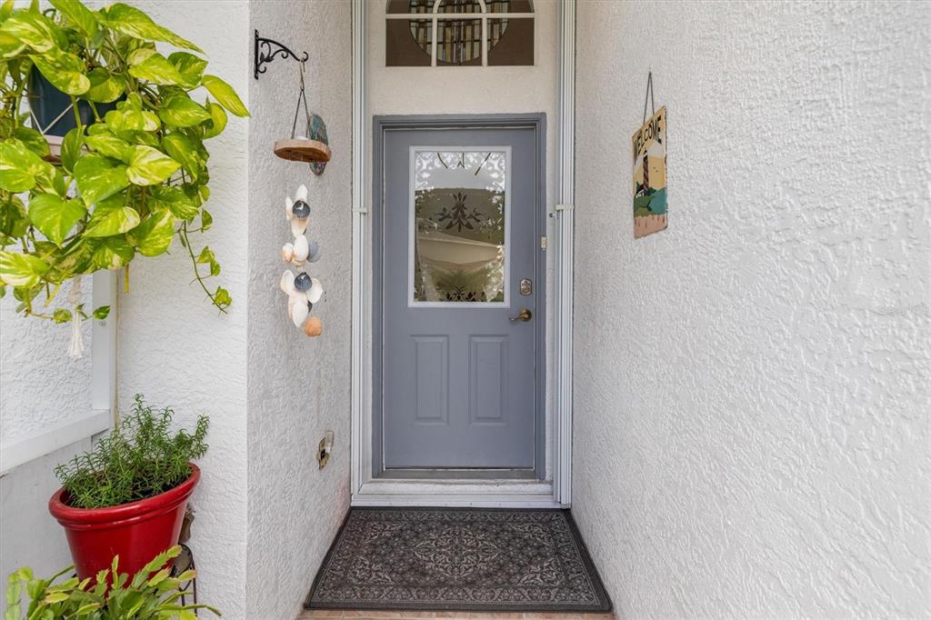 24167 Buckingham Way Punta Gorda, FL 33980 - Photo 3 of 42 a view of a entryway door of the house