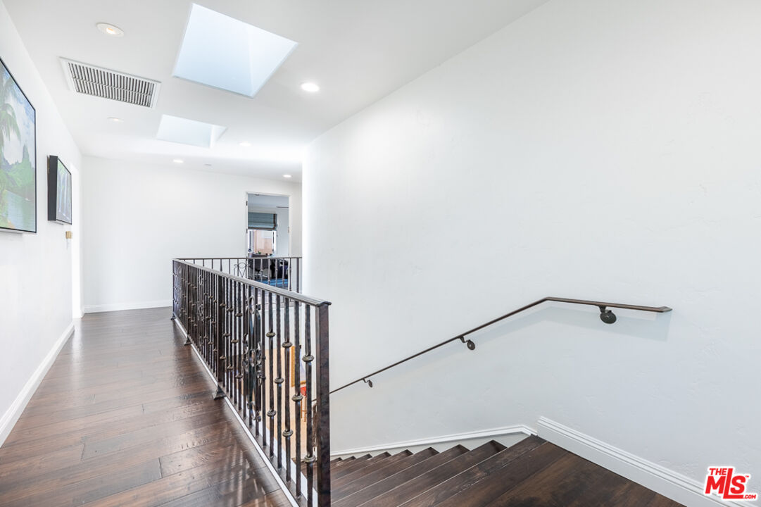 12622 Promontory Road Los Angeles, CA 90049 - Photo 22 of 53 a view of a hallway with entryway