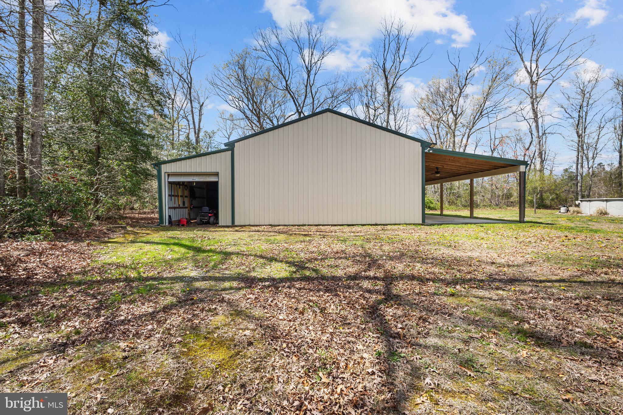 153 Crystal Road Elmer, NJ 08318 - Photo 24 of 29 a view of a house with backyard and tree