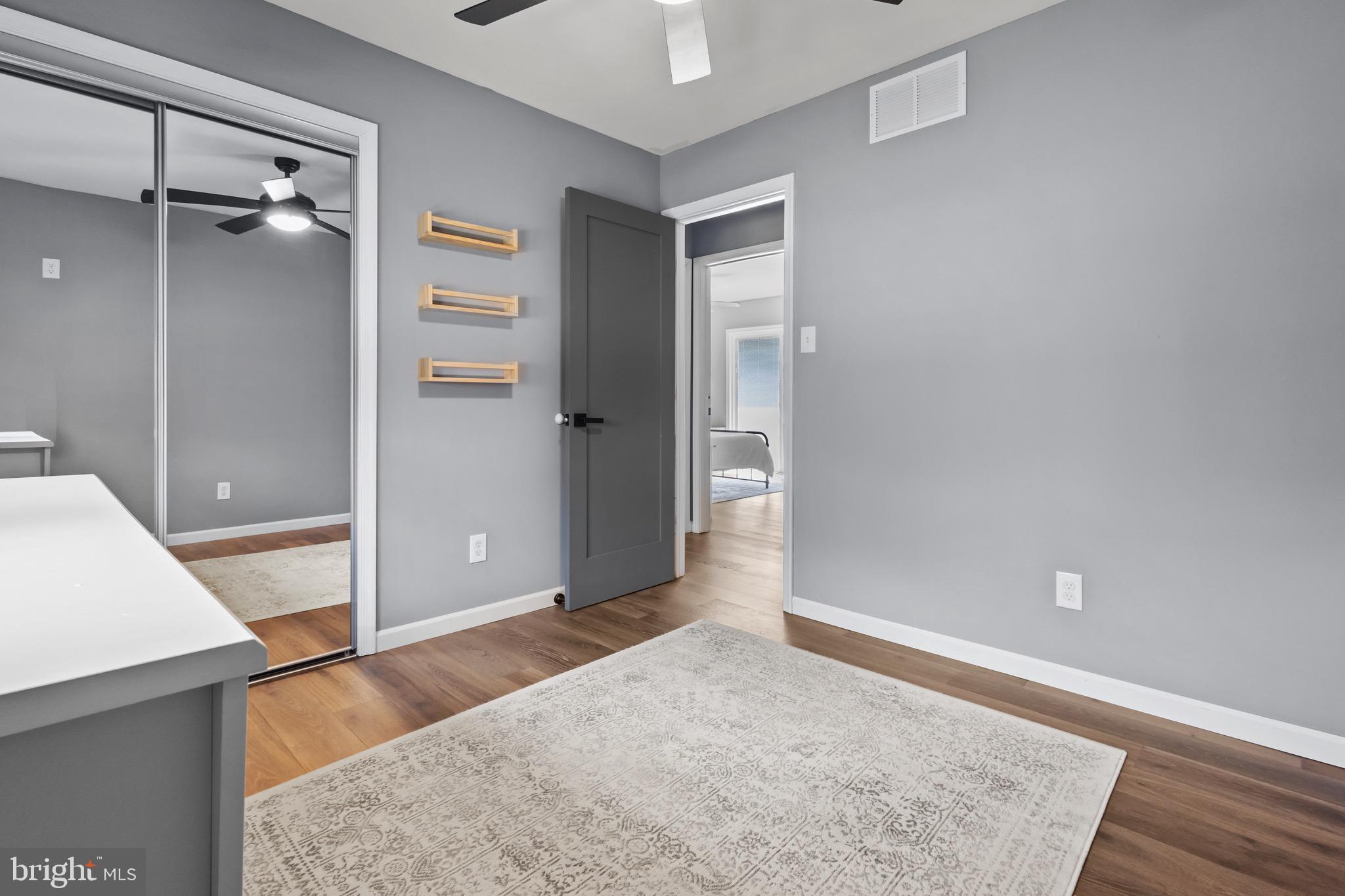 153 Crystal Road Elmer, NJ 08318 - Photo 10 of 29 wooden floor and a bathroom in a bathroom