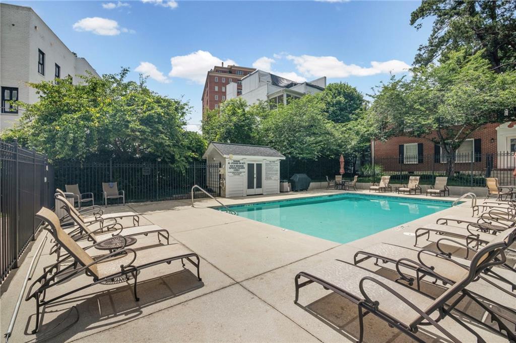 3675 Peachtree Road Northeast, Unit 45 Atlanta, GA 30319 - Photo 4 of 42 a view of a house with backyard and sitting area