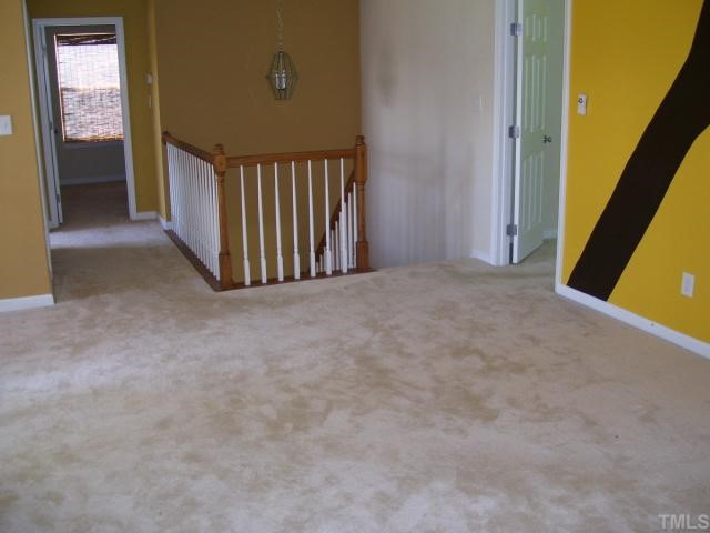 5701 Running Fox Lane Raleigh, NC 27703 - Photo 6 of 9 a view of a hallway