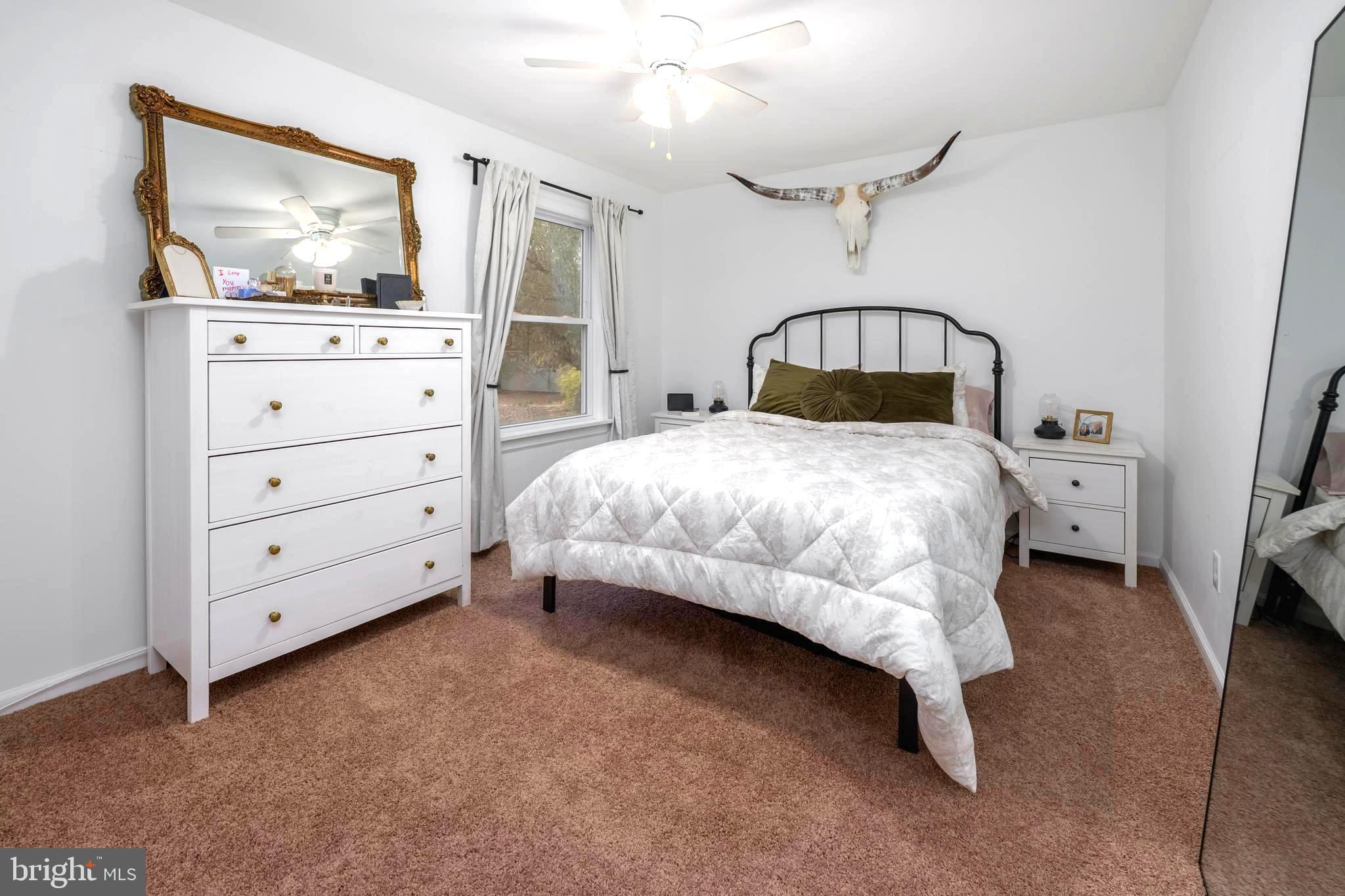 144 Burrs Mill Road Southampton, NJ 08088 - Photo 9 of 17 a bedroom with a bed and window