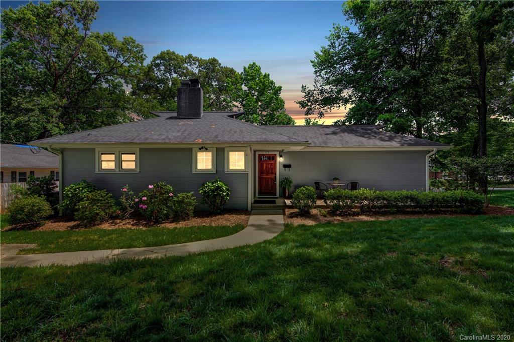 173 Callahan Street Rutherfordton, NC 28139 - Photo 1 of 25 a front view of a house with a yard and trees