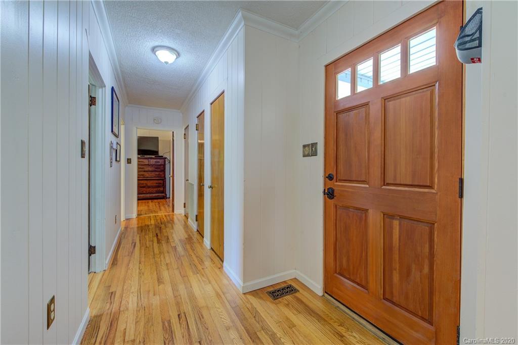 173 Callahan Street Rutherfordton, NC 28139 - Photo 16 of 25 a view of hallway with wooden floor