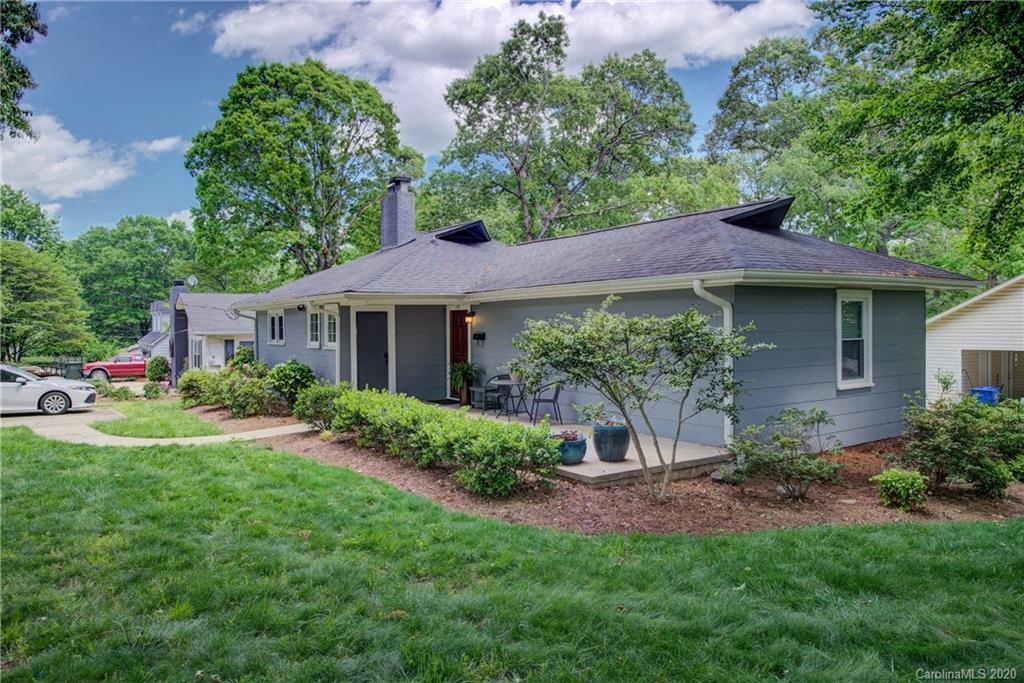 173 Callahan Street Rutherfordton, NC 28139 - Photo 5 of 25 a view of a house with a yard and a garden