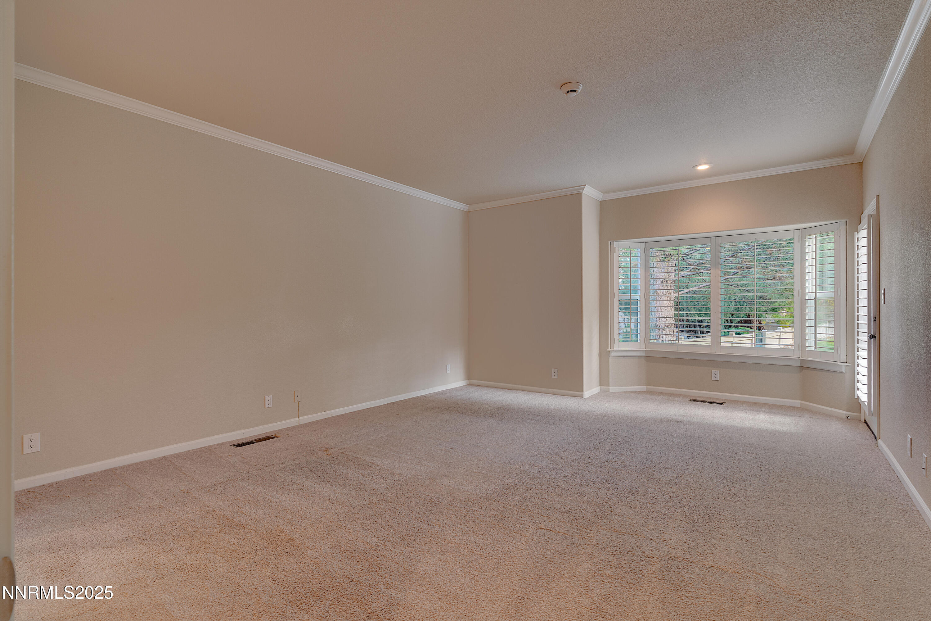 4052 Caughlin Creek Road Reno, NV 89519 - Photo 26 of 37 a view of an empty room with a window