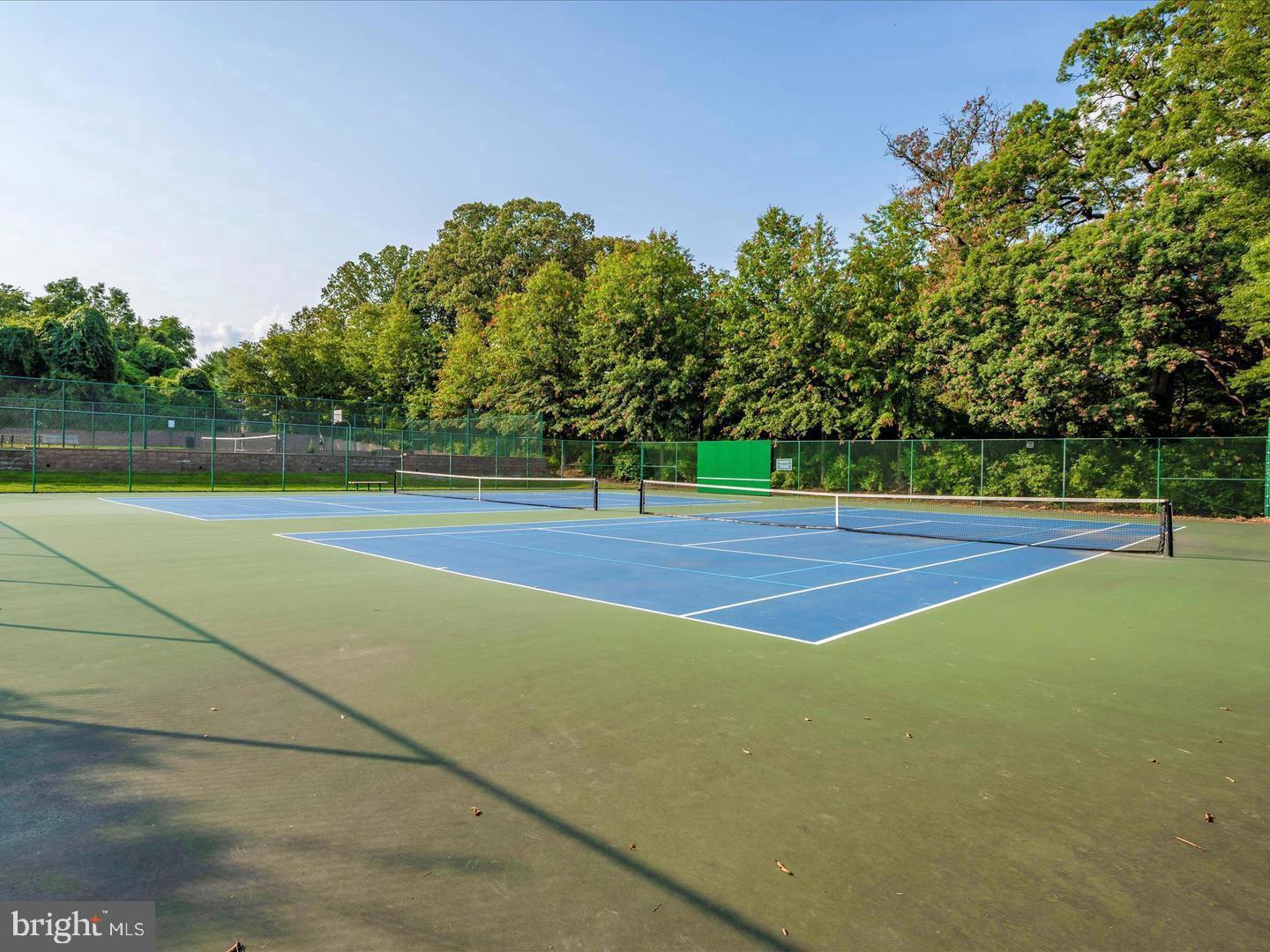 913 Highland Ridge Avenue Gaithersburg, MD 20878 - Photo 30 of 38 a view of an outdoor space and tennis court