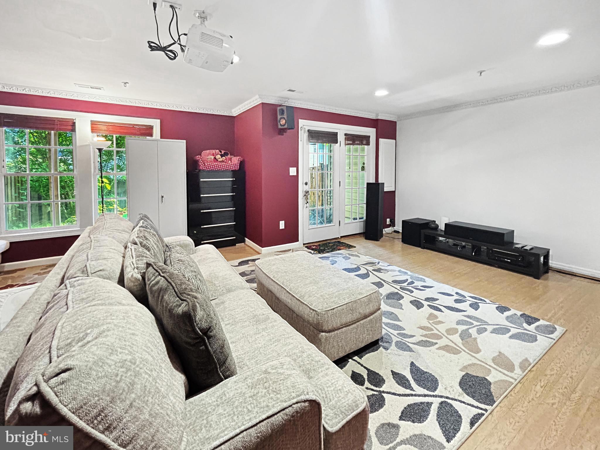 913 Highland Ridge Avenue Gaithersburg, MD 20878 - Photo 8 of 38 a living room with furniture and a large window