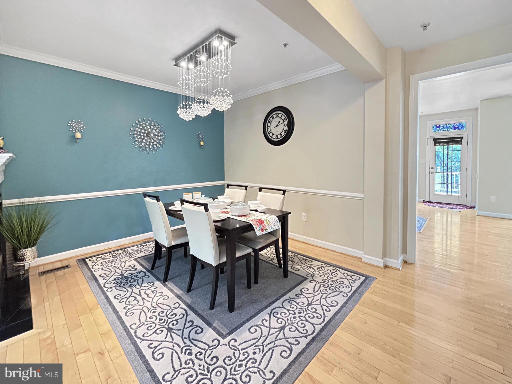 913 Highland Ridge Avenue Gaithersburg, MD 20878 - Photo 10 of 38 a view of a dining room with furniture