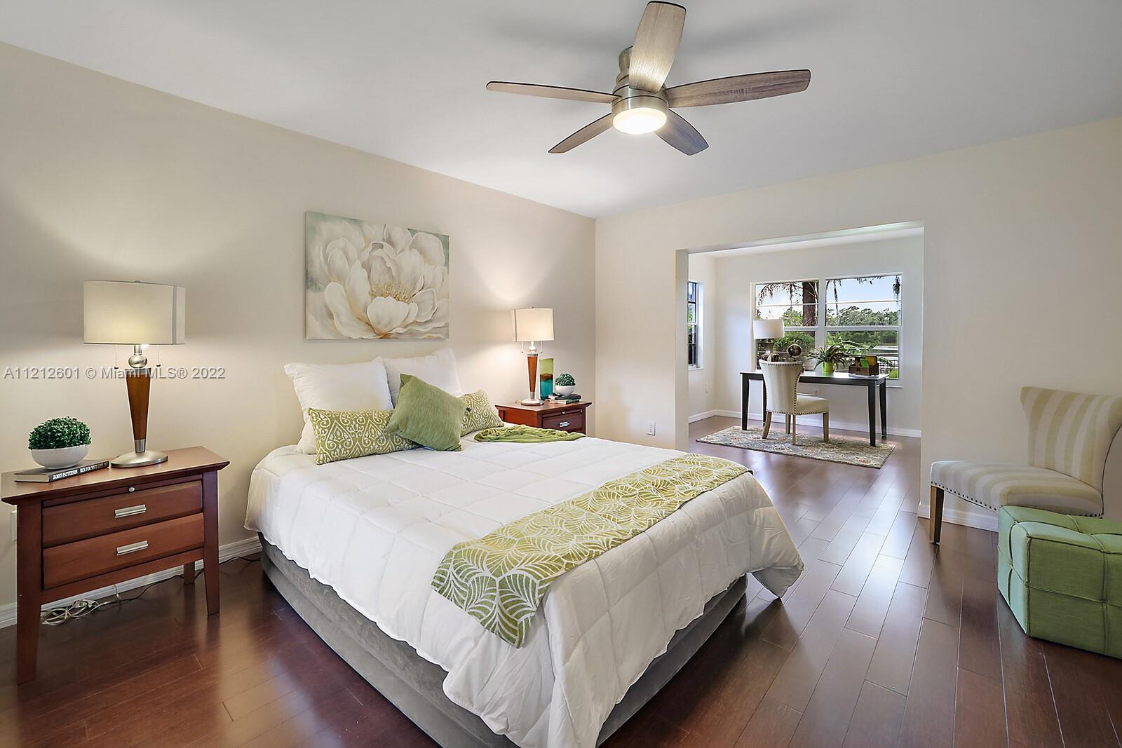 3052 Pine Cove Place Eustis, FL 32726 - Photo 13 of 32 a bedroom with bed and window