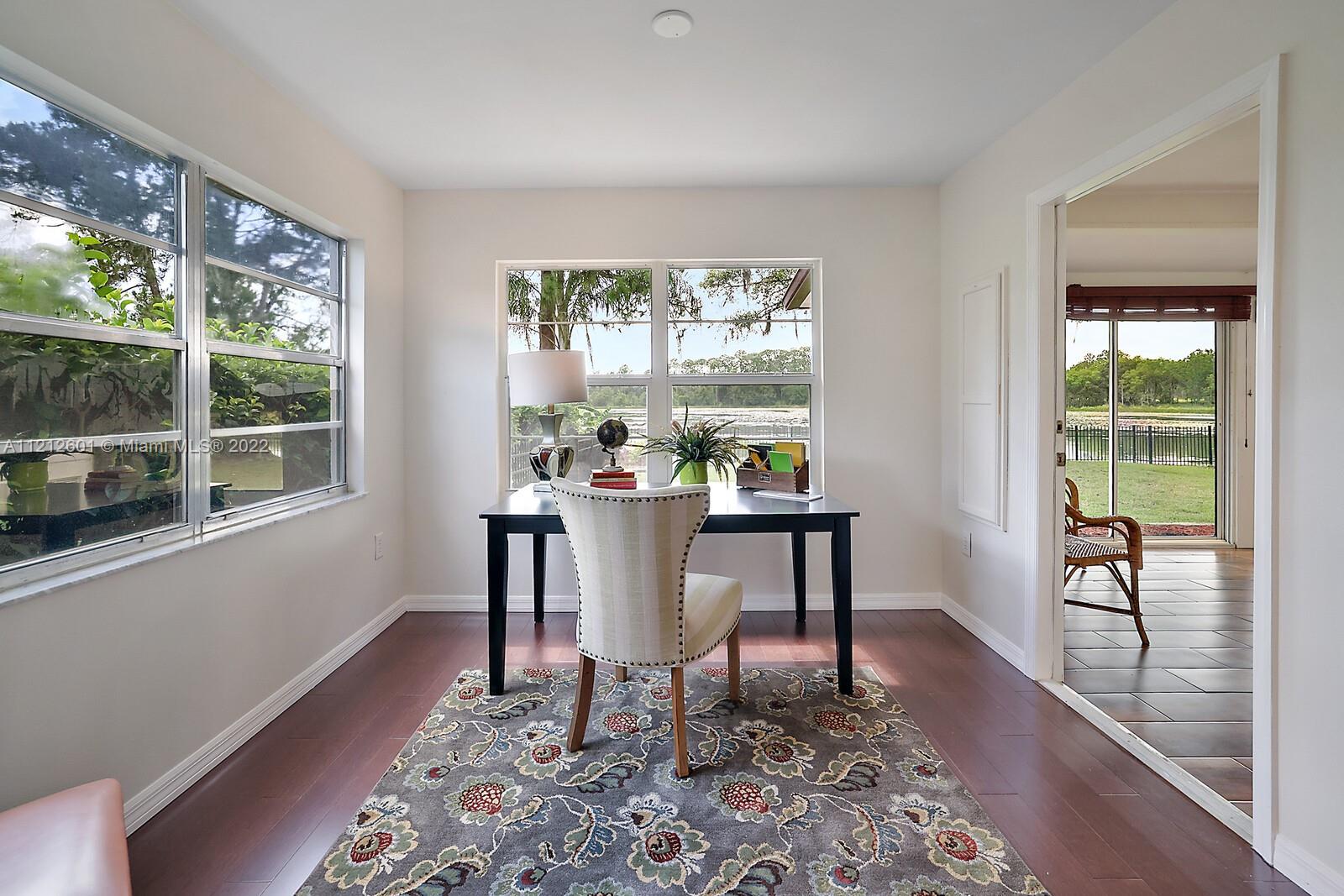 3052 Pine Cove Place Eustis, FL 32726 - Photo 14 of 32 a dining room with furniture and window