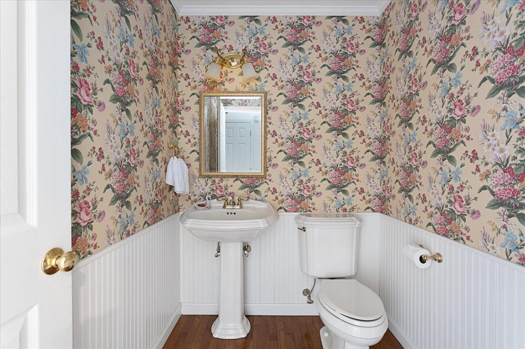 16 Carter Road Shrewsbury, MA 01545 - Photo 20 of 42 a bathroom with a toilet sink and mirror