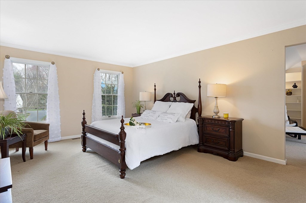 16 Carter Road Shrewsbury, MA 01545 - Photo 22 of 42 a spacious bedroom with a bed and a couch