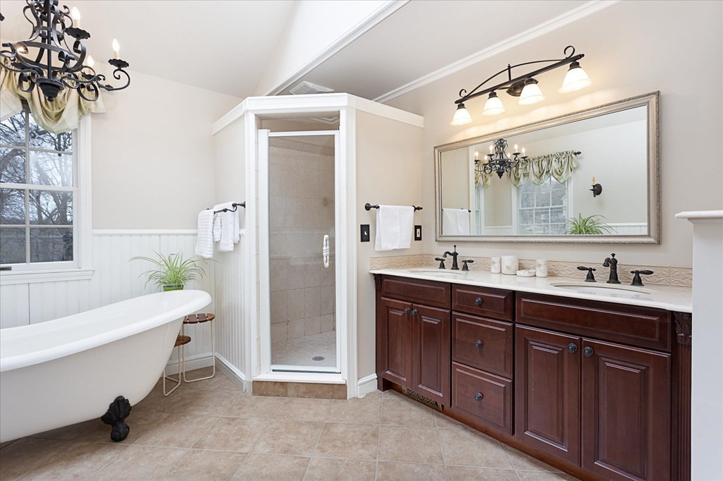 16 Carter Road Shrewsbury, MA 01545 - Photo 24 of 42 a spacious bathroom with a double vanity sink mirror and bathtub
