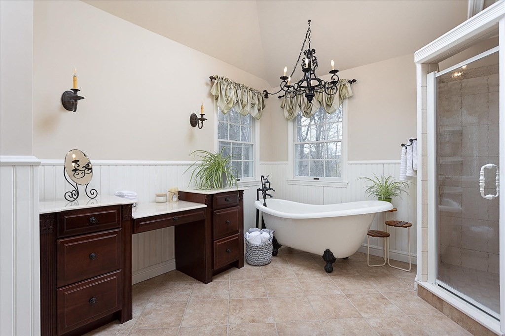 16 Carter Road Shrewsbury, MA 01545 - Photo 25 of 42 a spacious bathroom with a bathtub sink and a toilet