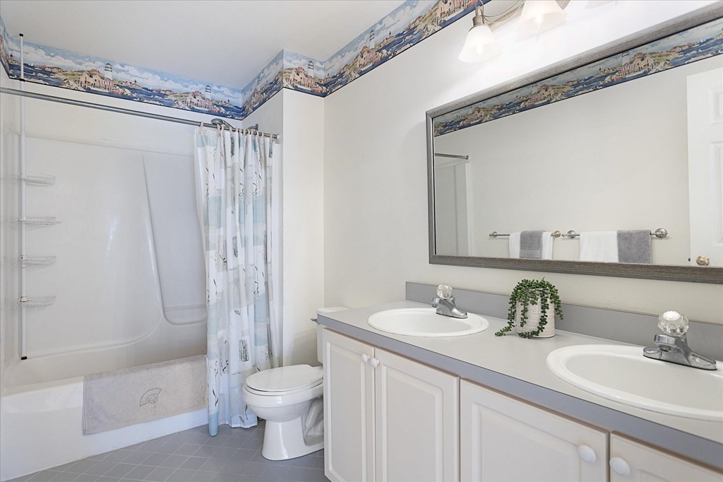 16 Carter Road Shrewsbury, MA 01545 - Photo 29 of 42 a bathroom with a granite countertop sink toilet and shower