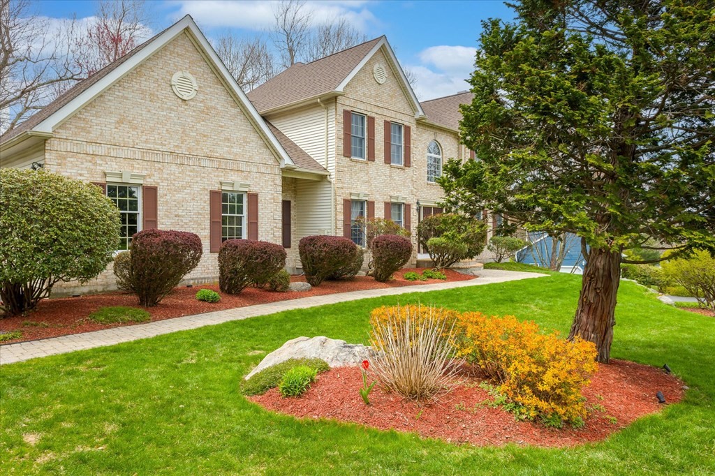 16 Carter Road Shrewsbury, MA 01545 - Photo 3 of 42 a front view of a house with garden