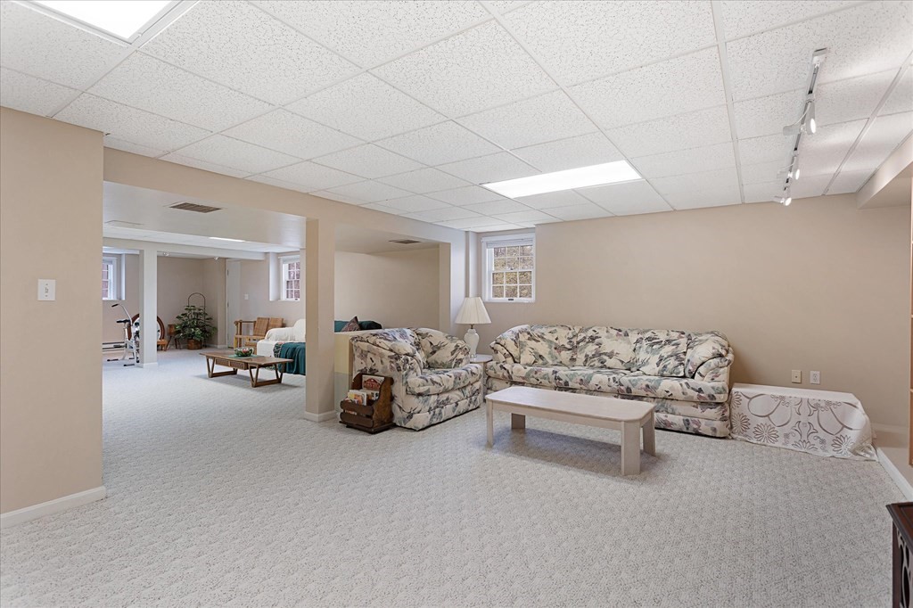 16 Carter Road Shrewsbury, MA 01545 - Photo 34 of 42 a living room with furniture and a couch