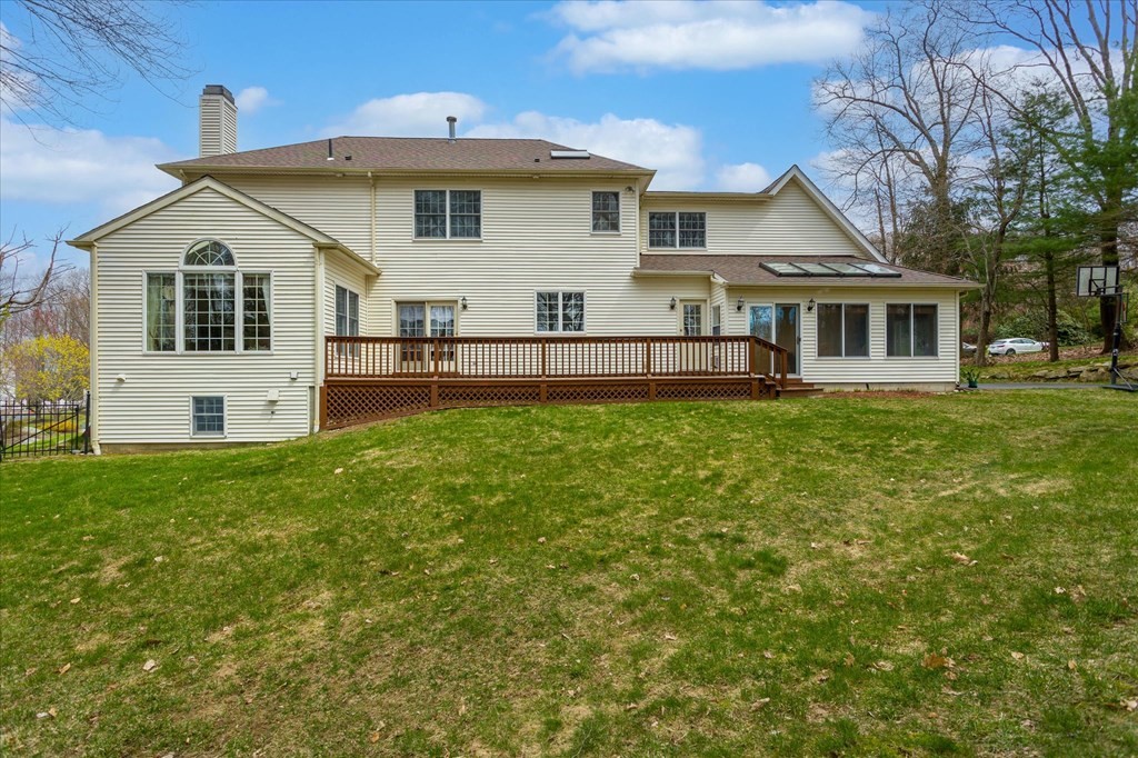 16 Carter Road Shrewsbury, MA 01545 - Photo 40 of 42 a front view of a house with a yard