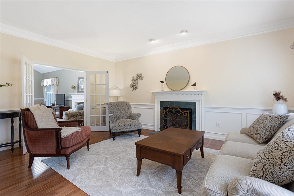16 Carter Road Shrewsbury, MA 01545 - Photo 7 of 42 a living room with furniture and a fireplace