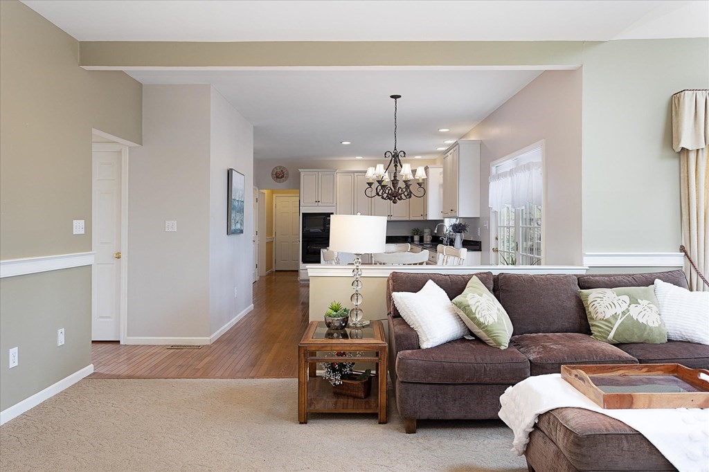 16 Carter Road Shrewsbury, MA 01545 - Photo 10 of 42 a living room with furniture and kitchen view